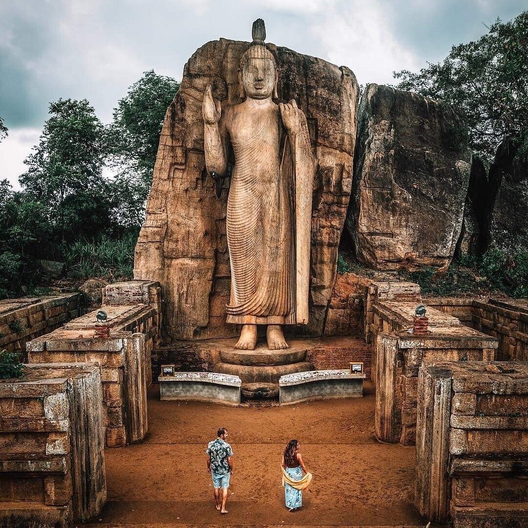 The ancient Avukana Buddha statue carved from rock in Sri Lanka's Cultural Triangle
